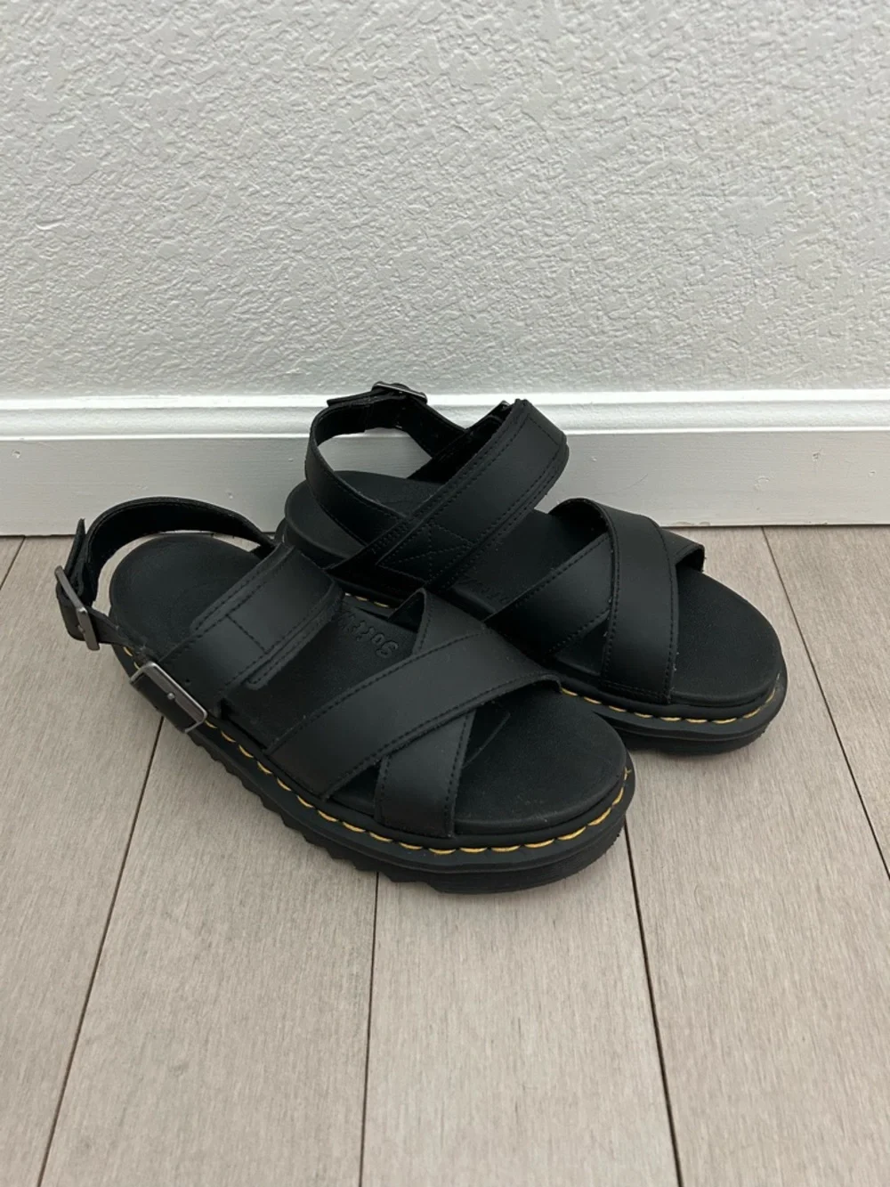 Dr. Martens Black Platform Crisscross Sandals with Yellow Stitching
